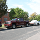 Illustration for article titled Towing A Race Car With A Small House: The Silverado 2500 High Country